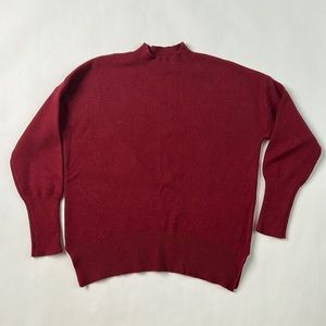 Red oversized sweater, mock neck side split